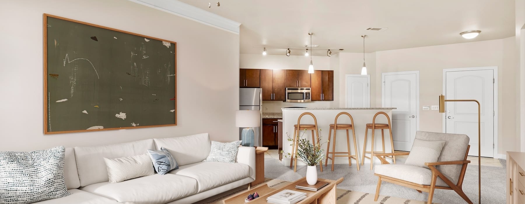 living area that includes ample seating spaces and bright lighting